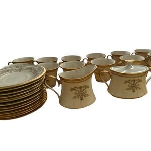 28 Piece Lenox Tea Set. Includes 13 Tea Cups, 13 Saucers And Sugar And Cream Pot